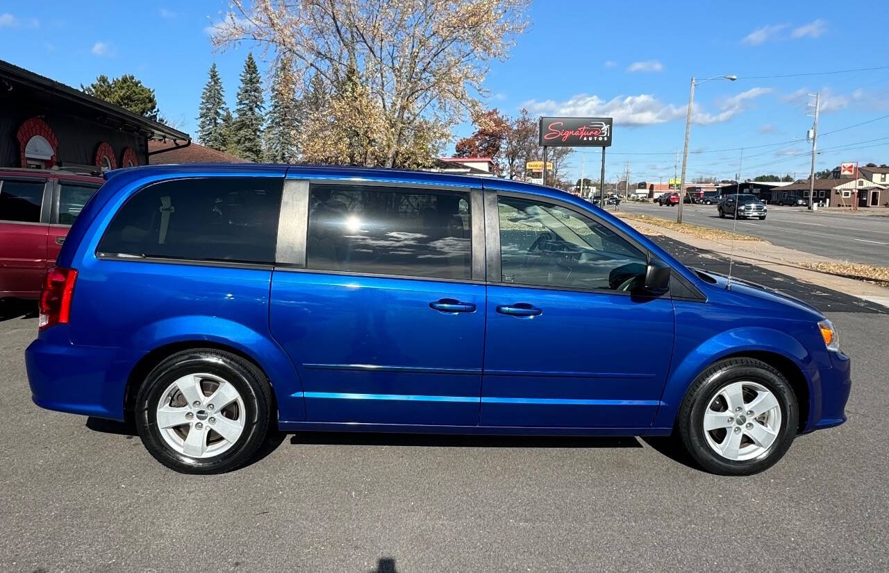 2013 Dodge Grand Caravan for sale at SIGNATURE AUTOS LLC in Weston, WI