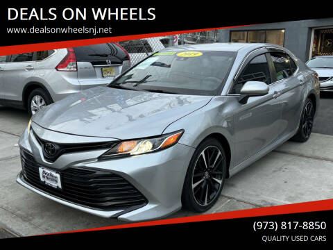 2019 Toyota Camry for sale at DEALS ON WHEELS in Newark NJ