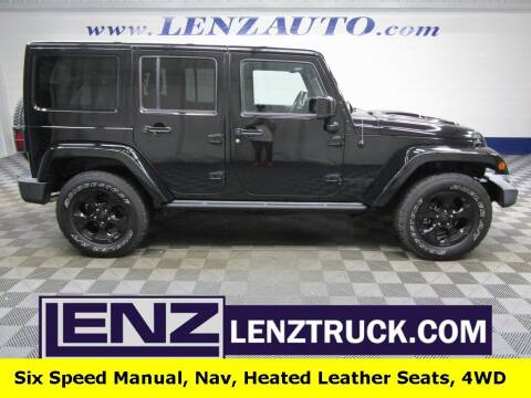 2015 Jeep Wrangler Unlimited for sale at LENZ TRUCK CENTER in Fond Du Lac WI