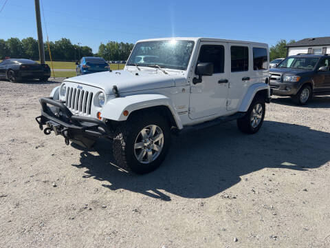 2012 Jeep Wrangler Unlimited for sale at Baileys Truck and Auto Sales in Effingham SC