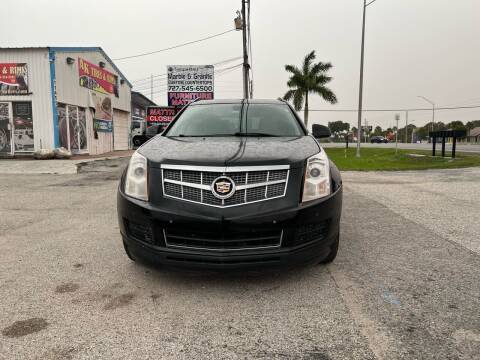 2014 Cadillac SRX for sale at ONYX AUTOMOTIVE, LLC in Largo FL