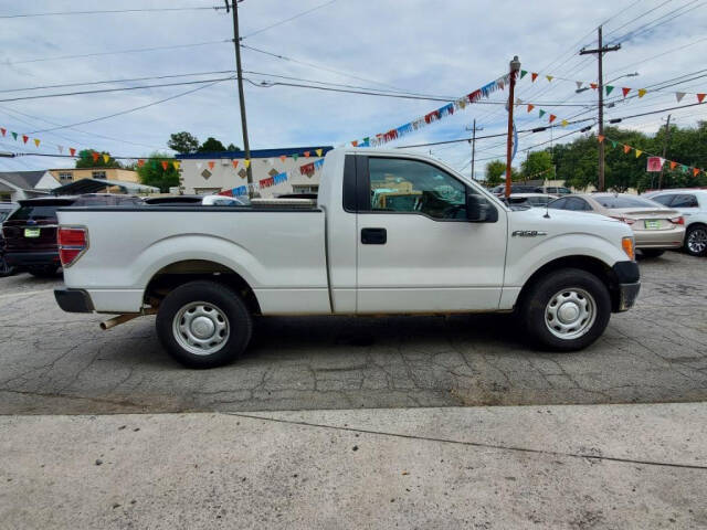 2013 Ford F-150 for sale at DAGO'S AUTO SALES LLC in Dalton, GA