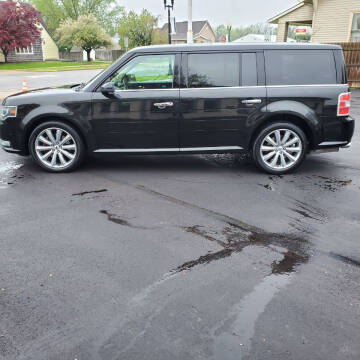 2014 Ford Flex for sale at MADDEN MOTORS INC in Peru IN