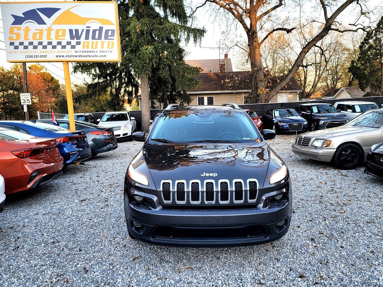 2015 Jeep Cherokee for sale at Statewide Auto LLC in Akron, OH