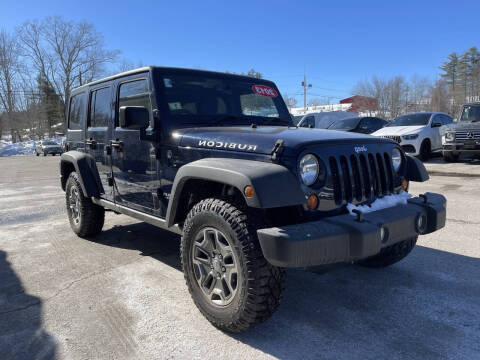 2013 Jeep Wrangler Unlimited for sale at DAHER MOTORS OF KINGSTON in Kingston NH