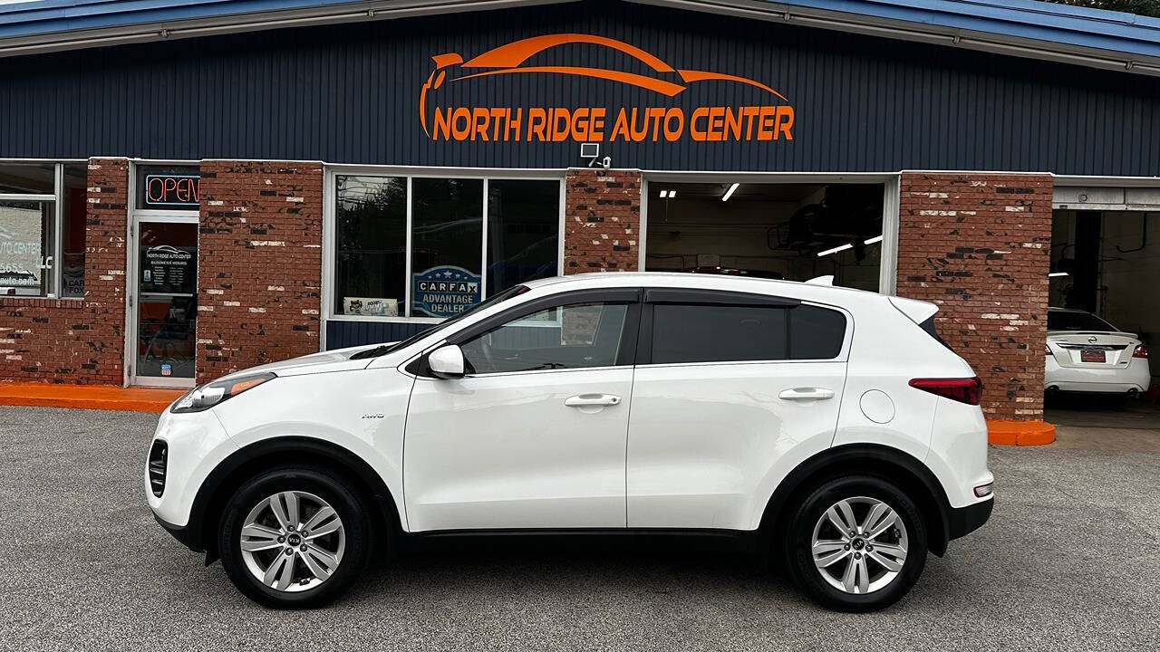 2017 Kia Sportage for sale at North Ridge Auto Center LLC in Madison, OH