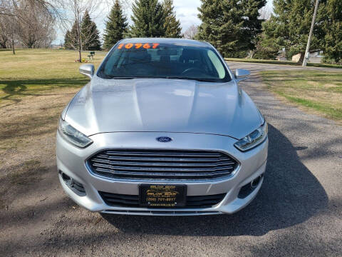 2016 Ford Fusion for sale at BELOW BOOK AUTO SALES in Idaho Falls ID