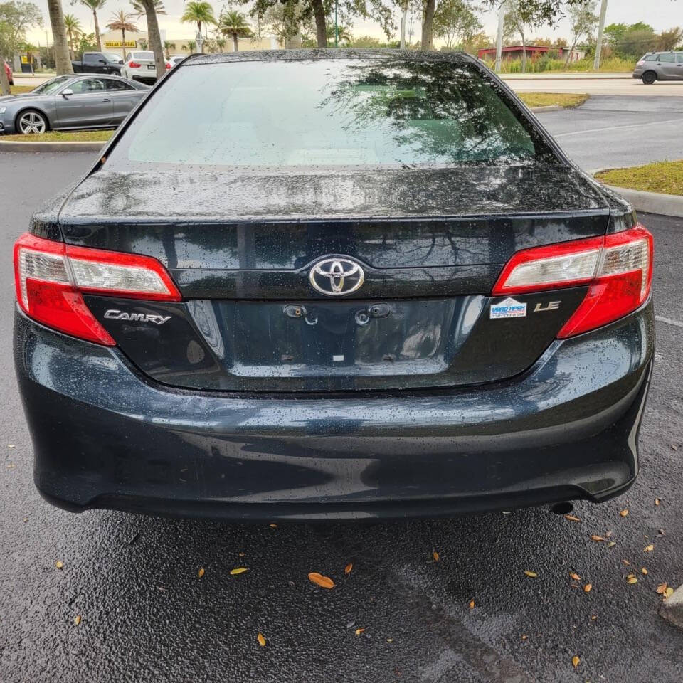 2014 Toyota Camry for sale at VERO APEX in Vero Beach, FL