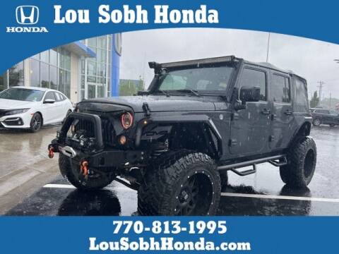 2017 Jeep Wrangler Unlimited for sale at Lou Sobh Honda in Cumming GA