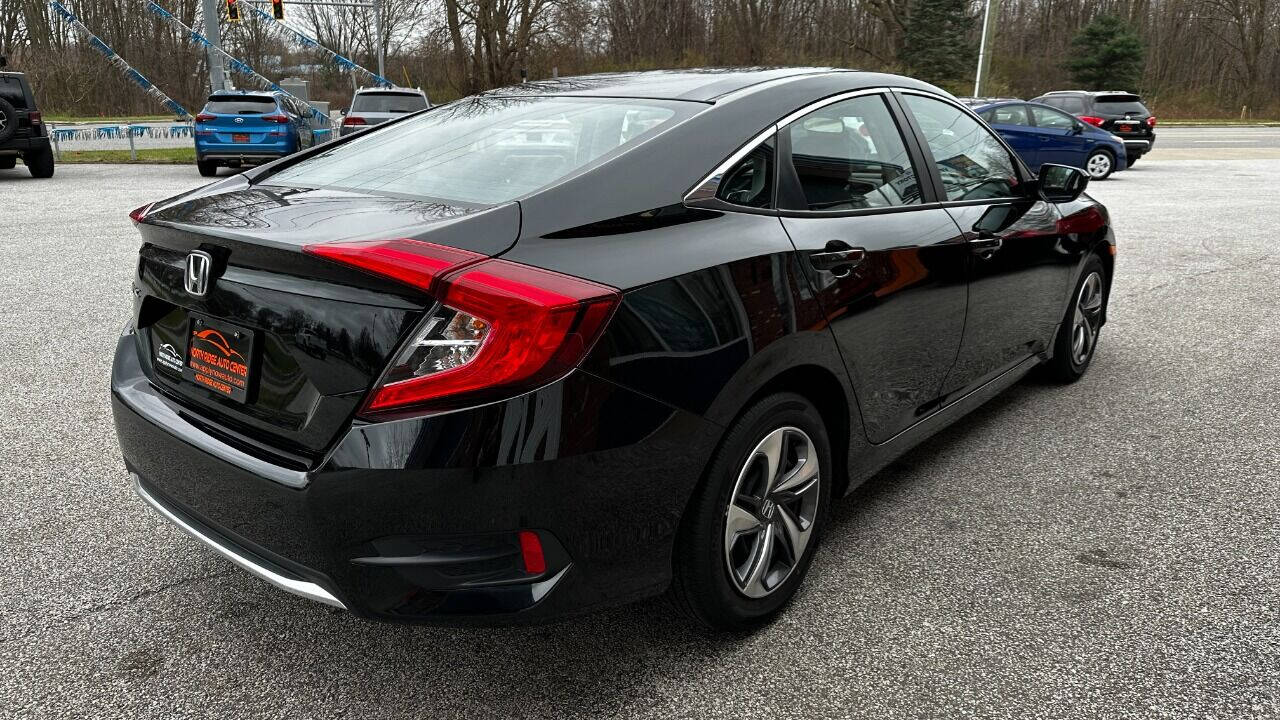 2021 Honda Civic for sale at North Ridge Auto Center LLC in Madison, OH