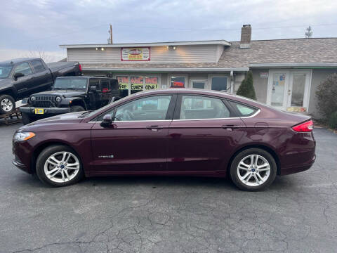2018 Ford Fusion Hybrid for sale at Revolution Motors LLC in Wentzville MO