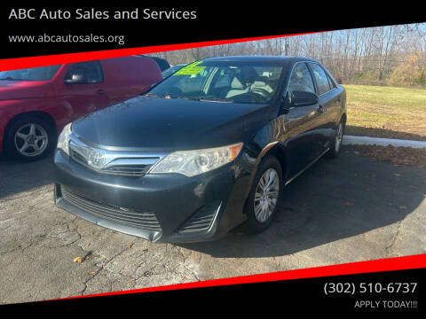 2012 Toyota Camry for sale at ABC Auto Sales and Services in New Castle DE