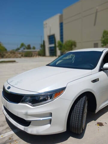 2016 Kia Optima for sale at E and M Auto Sales in Bloomington CA