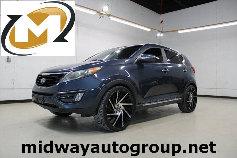 2016 Kia Sportage for sale at Midway Auto Group in Addison TX