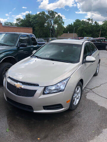 2012 Chevrolet Cruze for sale at HIDALGOS AUTO SALES in Omaha NE