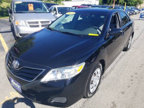 2010 Toyota Camry for sale at Howe's Auto Sales in Lowell MA