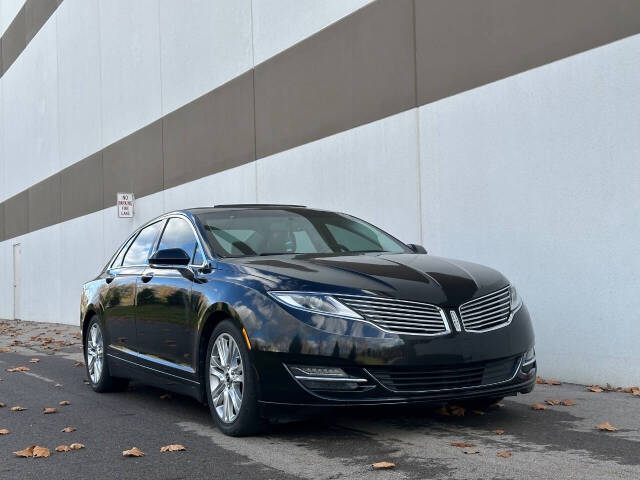 2015 Lincoln MKZ for sale at Phoenix Motor Co in Romulus, MI