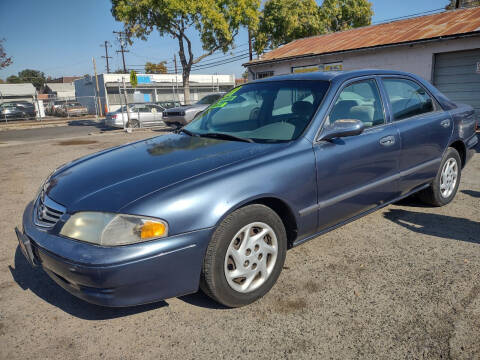2001 Mazda 626 for sale at Larry's Auto Sales Inc. in Fresno CA