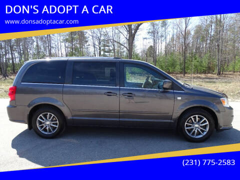 2014 Dodge Grand Caravan for sale at DON'S ADOPT A CAR in Cadillac MI