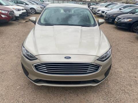 2019 Ford Fusion for sale at Good Auto Company LLC in Lubbock TX