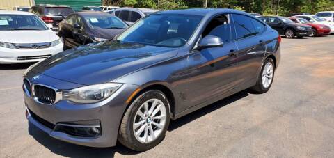 2014 BMW 3 Series for sale at GEORGIA AUTO DEALER, LLC in Buford GA