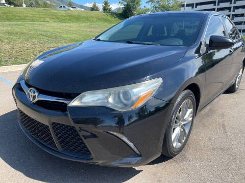 2015 Toyota Camry for sale at DRIVE N BUY AUTO SALES in Ogden UT
