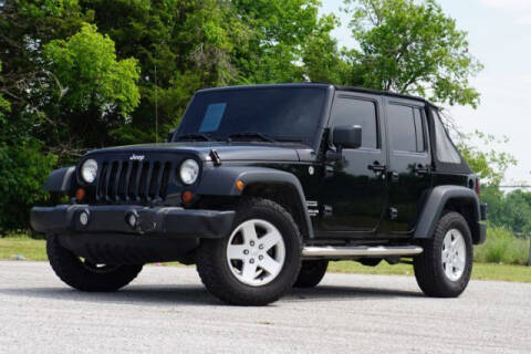 2012 Jeep Wrangler Unlimited for sale at Si Auto Inc in Arlington TX