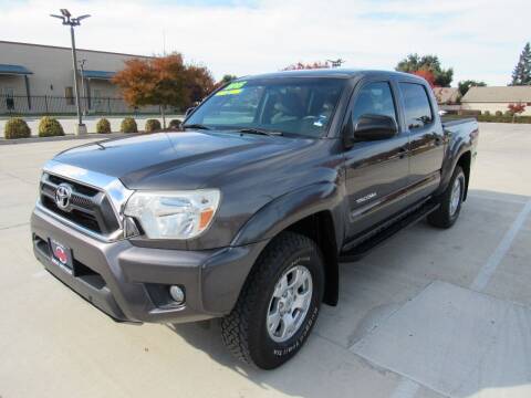 2015 Toyota Tacoma for sale at Repeat Auto Sales Inc. in Manteca CA
