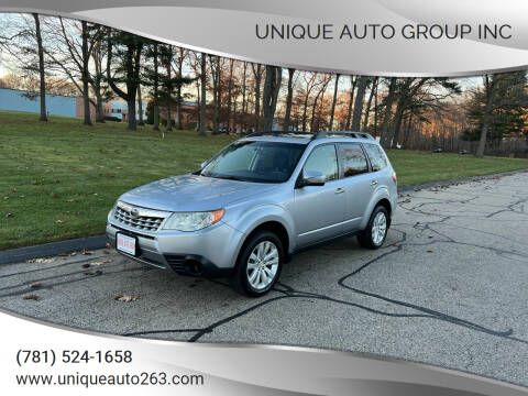 2012 Subaru Forester for sale at Unique Auto Group Inc in Whitman MA