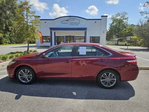 2015 Toyota Camry for sale at Magic Imports of Gainesville in Gainesville FL