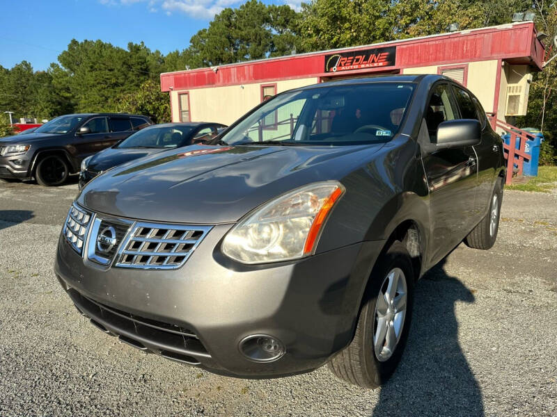 2010 Nissan Rogue for sale at REDLINE AUTO SALES in Durham NC