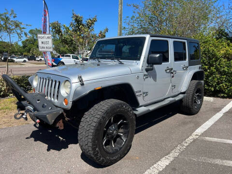 2012 Jeep Wrangler Unlimited for sale at Bay City Autosales in Tampa FL