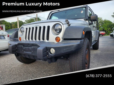 2012 Jeep Wrangler Unlimited for sale at Premium Luxury Motors in Grayson GA