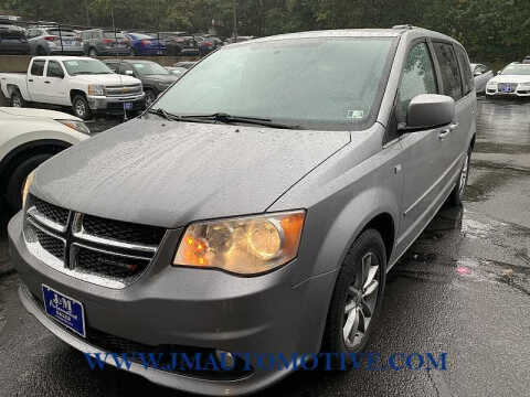 2014 Dodge Grand Caravan for sale at J & M Automotive in Naugatuck CT