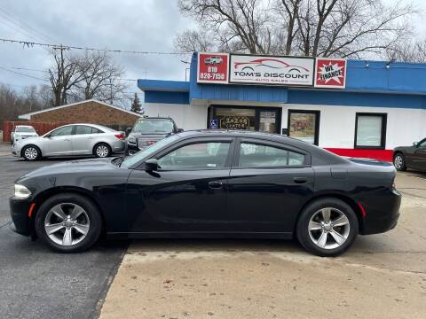 2015 Dodge Charger for sale at Tom's Discount Auto Sales in Flint MI