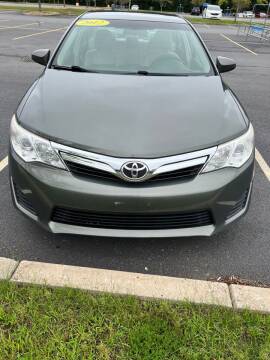 2012 Toyota Camry for sale at L A Used Cars in Abington MA