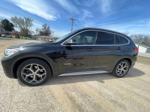 2016 BMW X1 for sale at Dave's Auto Care & Sales LLC in Camdenton MO