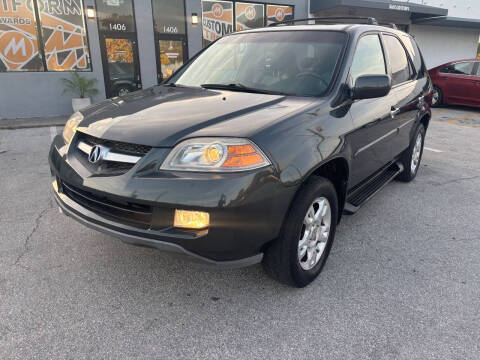 2004 Acura MDX for sale at UNITED AUTO BROKERS in Hollywood FL