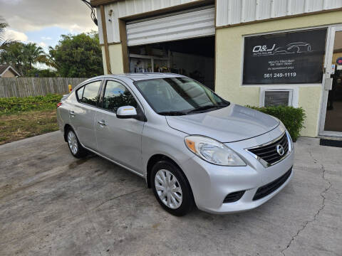 2014 Nissan Versa for sale at O & J Auto Sales in Royal Palm Beach FL