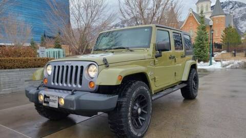 2013 Jeep Wrangler for sale at Classic Car Deals in Cadillac MI