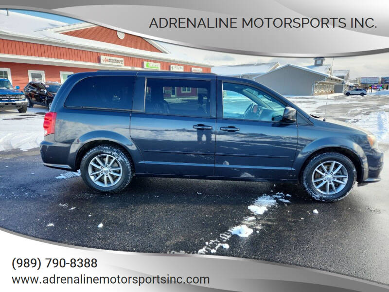2014 Dodge Grand Caravan for sale at Adrenaline Motorsports Inc. in Saginaw MI