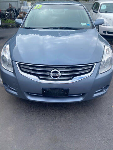 2012 Nissan Altima for sale at Right Choice Automotive in Rochester NY