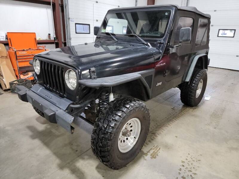 2000 Jeep Wrangler for sale at Hometown Automotive Service & Sales in Holliston MA