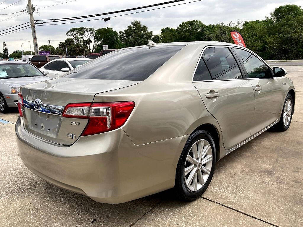 2014 Toyota Camry for sale at We Buy & Sell Cars Inc in Orlando, FL