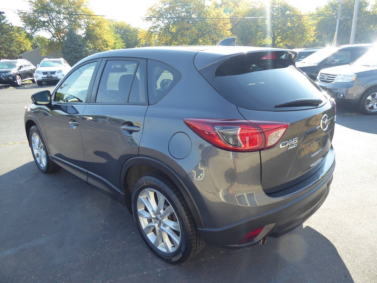 2014 Mazda CX-5 for sale at Lakeshore Autos in Holland, MI