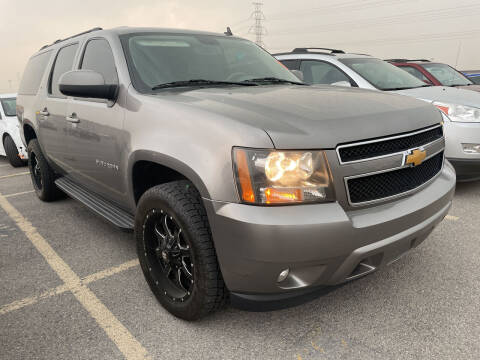 2009 Chevrolet Suburban for sale at BELOW BOOK AUTO SALES in Idaho Falls ID