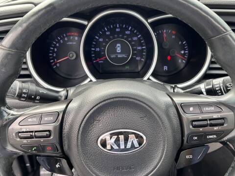 2015 Kia Optima for sale at Atlanta Unique Auto Sales in Norcross GA