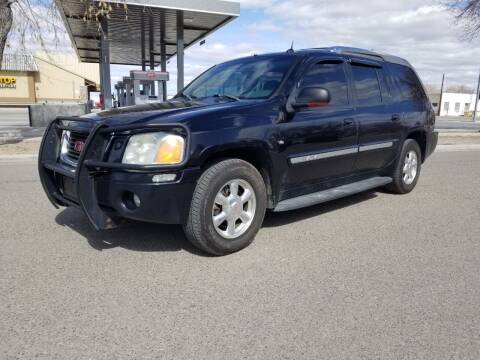 2004 GMC Envoy XUV for sale at KHAN'S AUTO LLC in Worland WY