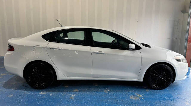 2015 Dodge Dart for sale at CAR MARKET AUTO GROUP in Sugar Land, TX