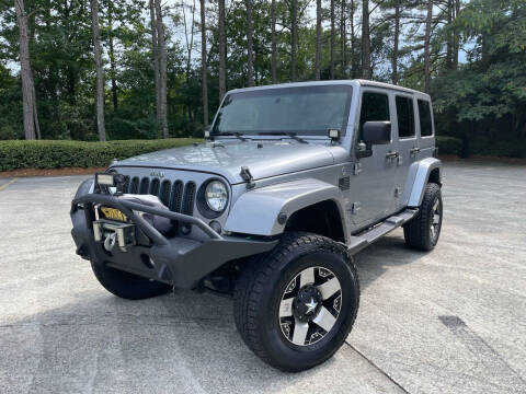 2014 Jeep Wrangler Unlimited for sale at Selective Cars & Trucks in Woodstock GA